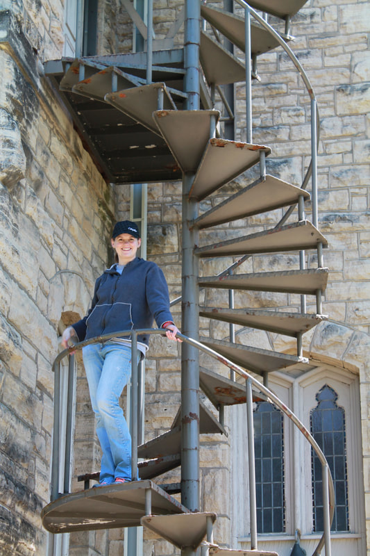 Jody on a spiral staircase in Marion, Iowa